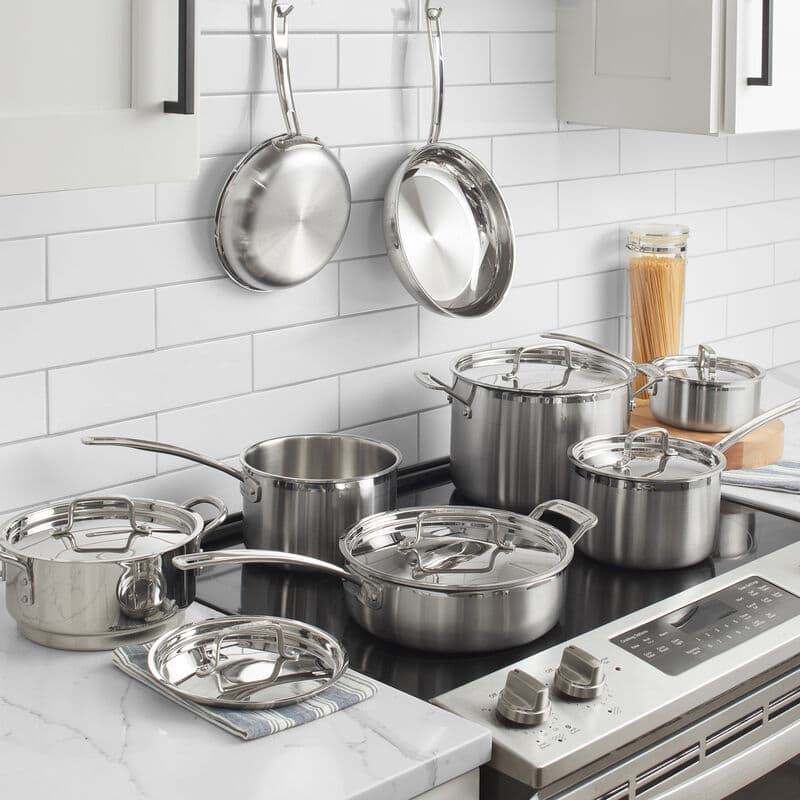 Cuisinart stainless cookware arranged in a working kitchen